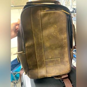 Brown 100% leather backpack for laptop and books with authenticity look